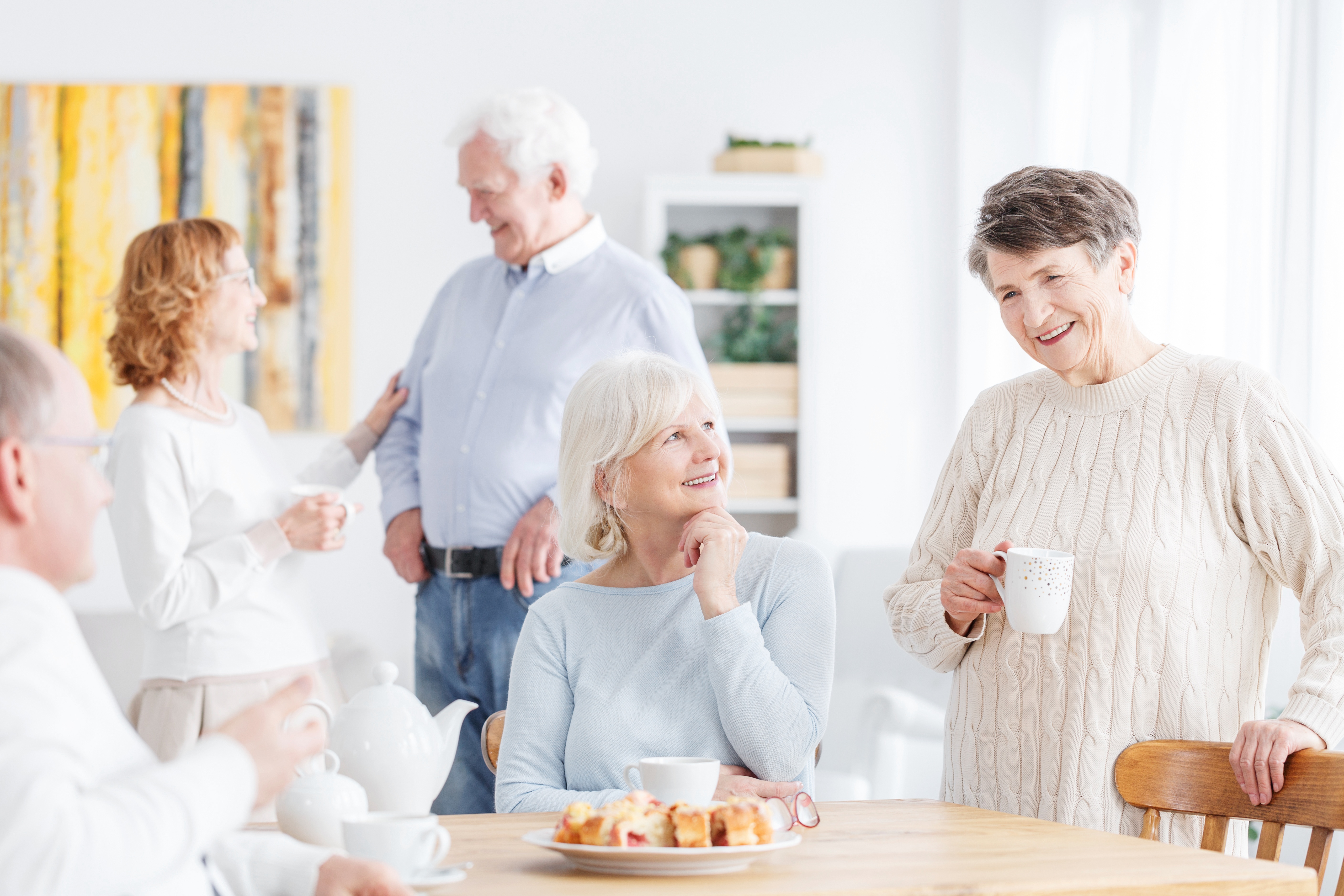 a group of people talking in a support group for copd